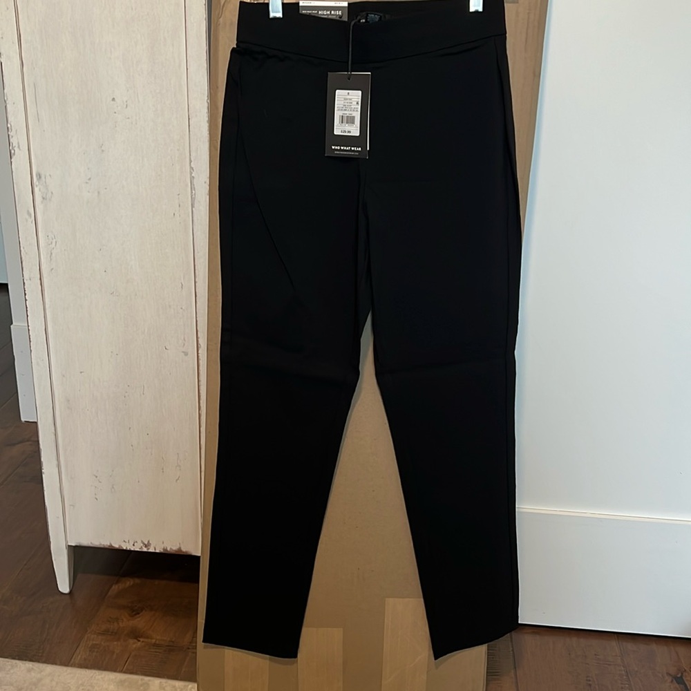 Women’s black high rise pants. Size 8